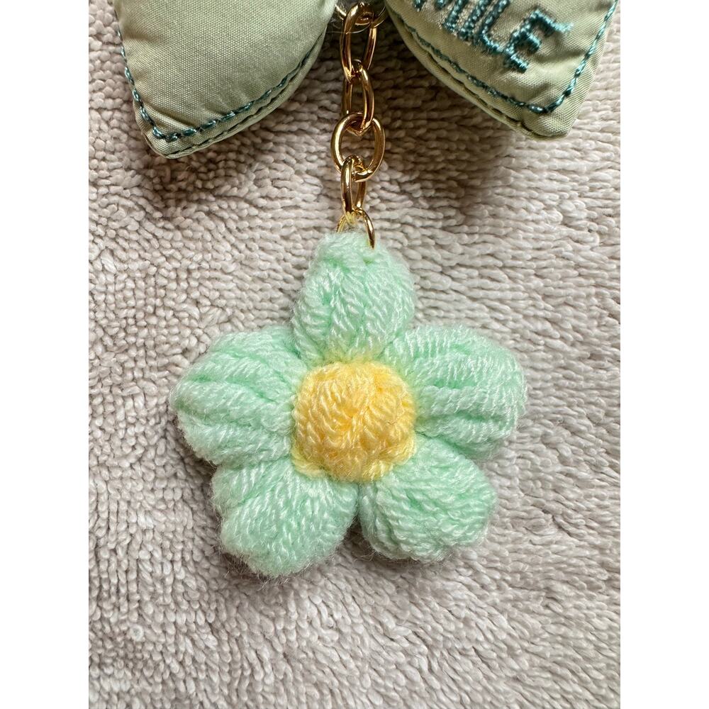 Green puffy bow with hanging flower keychain bag charm - Picture 4 of 5